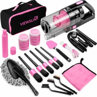 Comprehensive car cleaning kit with vacuum, brushes, and cloth.