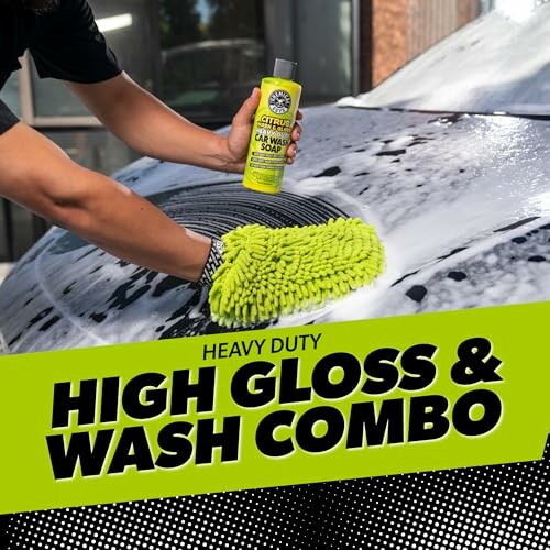 Person washing car with high gloss wash combo and green mitt.