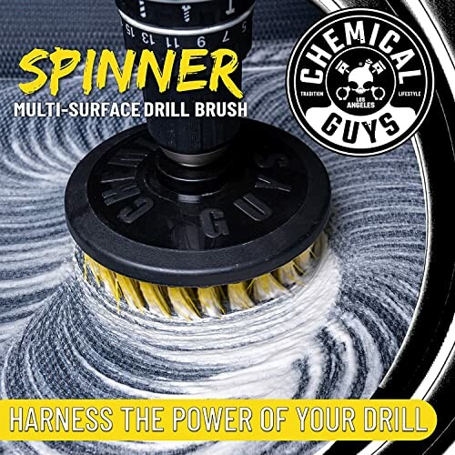 Chemical Guys multi-surface drill brush in use on a surface.